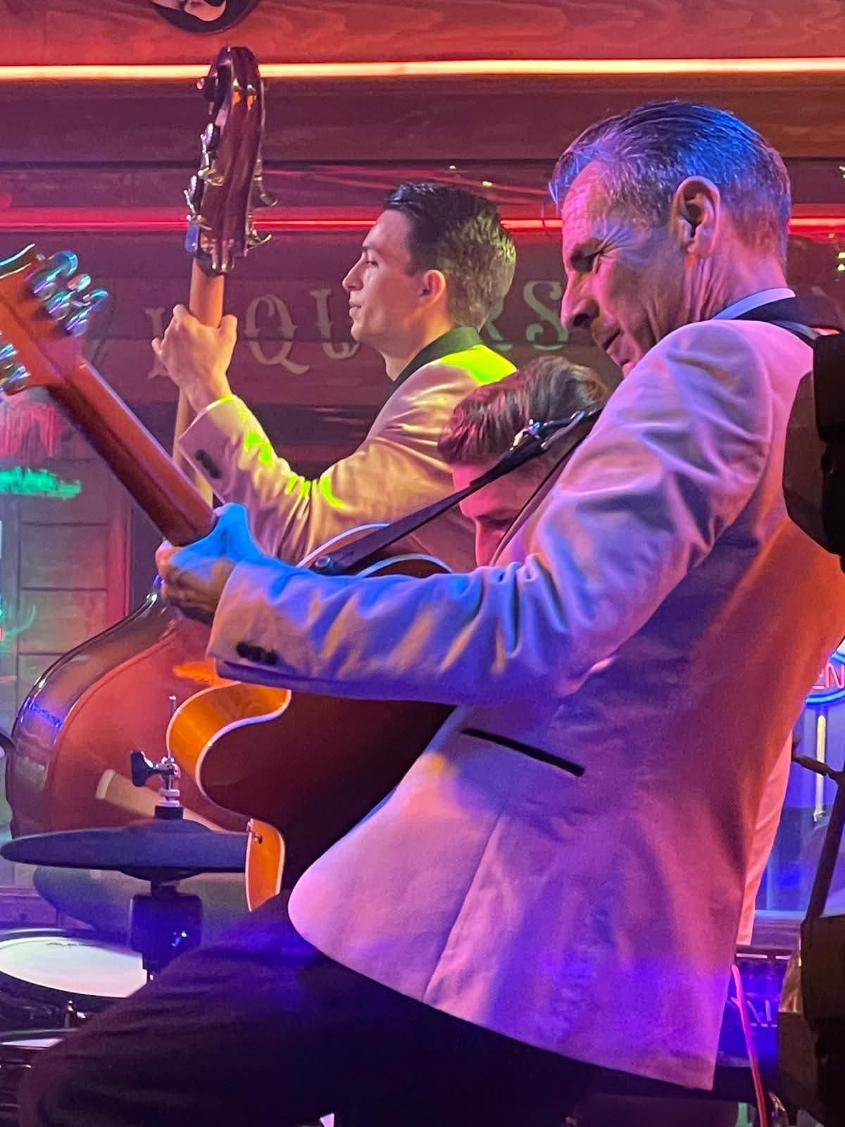 Guitarist and bassist close-up at the Western Saloon