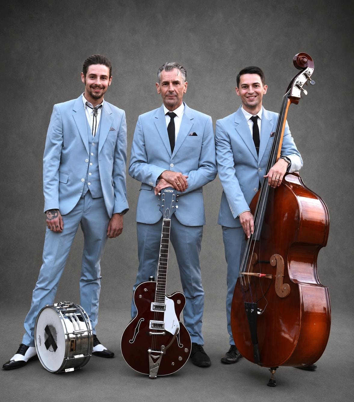Original Cool — promo shot in blue suits with instruments